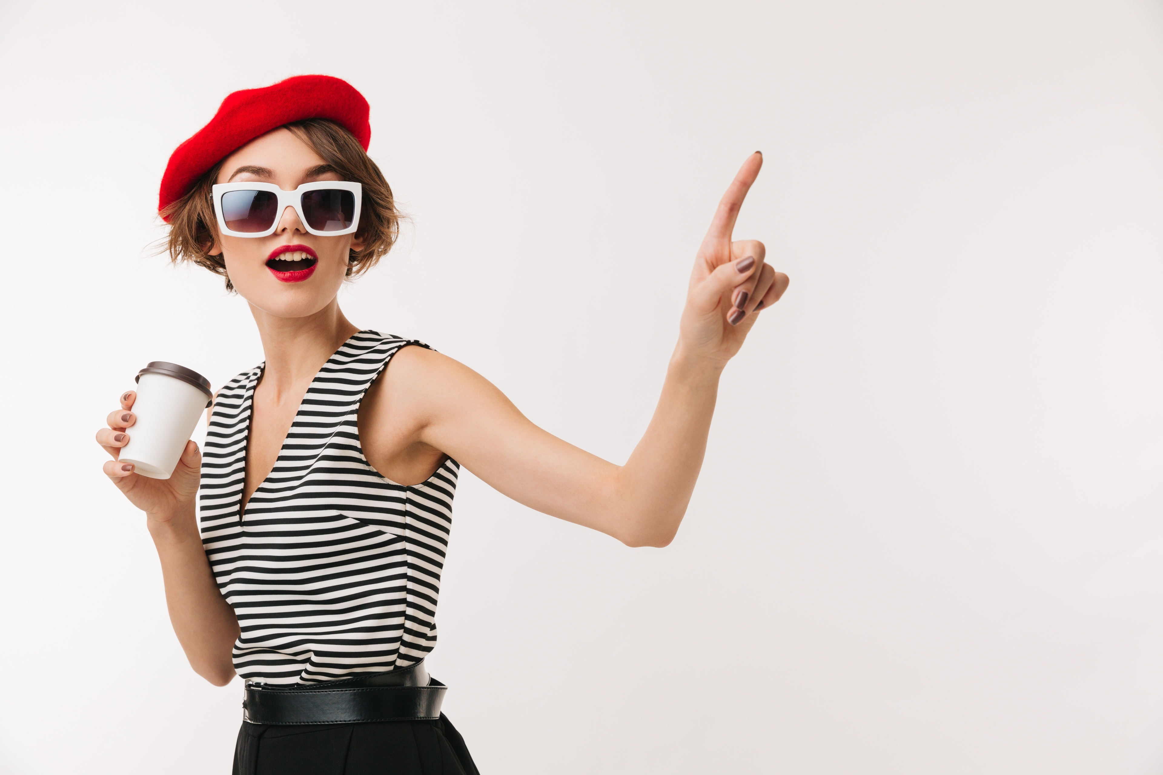 Portrait of a joyful woman wearing red beret