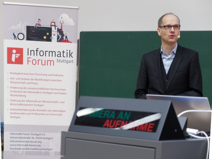 Prof. Dr. Ralf Küsters at the lectern.